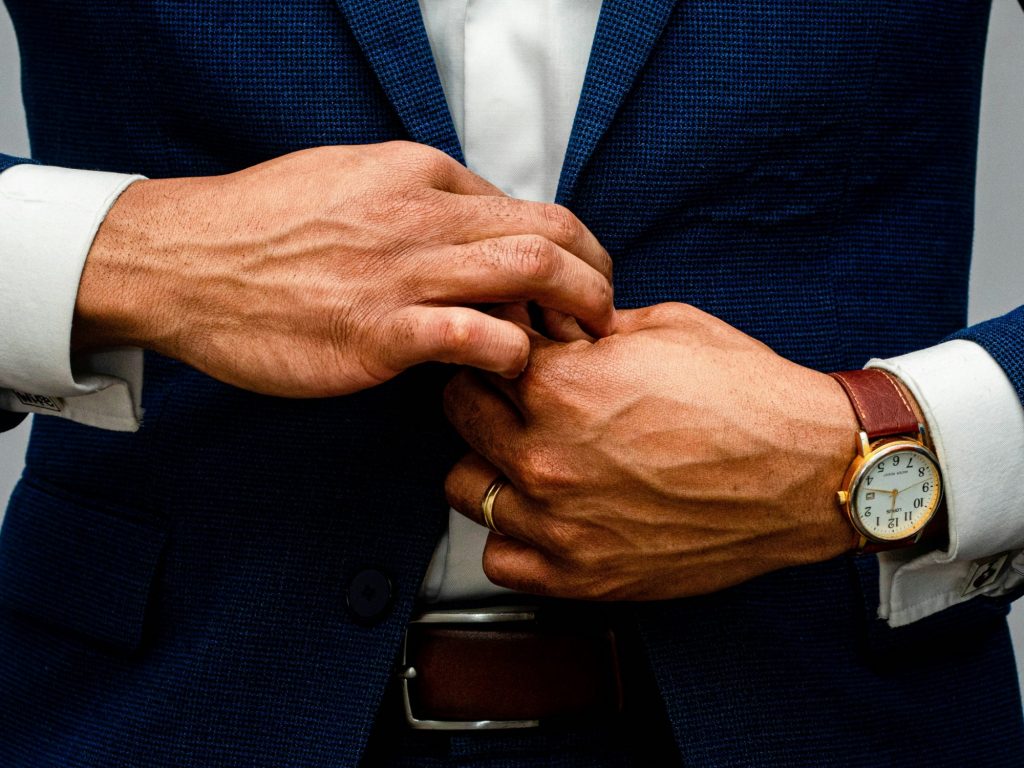 Man in a business suit as Google is embedding Gemini AI across the Android app lifecycle and boosting enterprise app adoption by addressing key concerns.