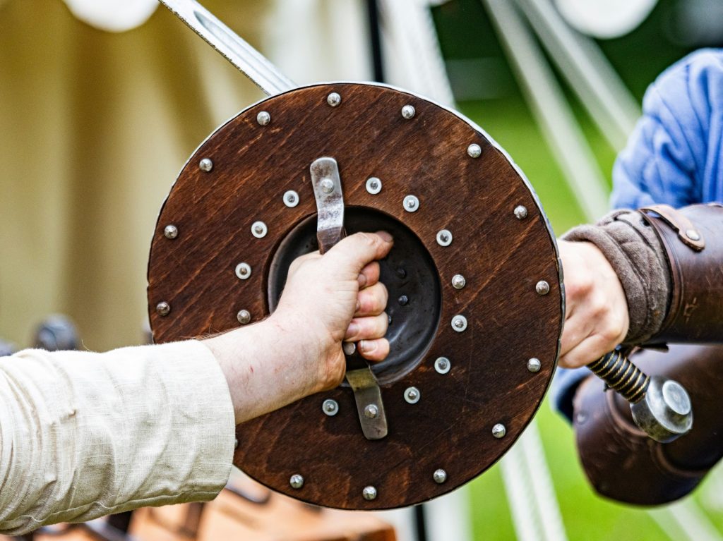 Person blocking a sword with a shield as an attack on the NuGet package registry shows how advanced open-source software supply chain attacks have become.